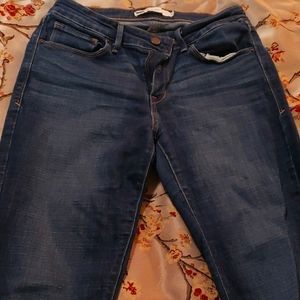 Levis Skinny dark rinse mid rise jeans